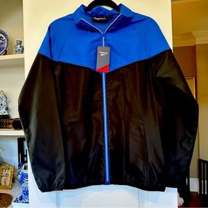 REEBOK Women’s golf full zip wind jacket side zip pockets